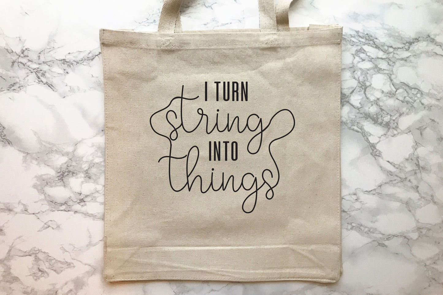 I Turn String Into Things Tote Bag